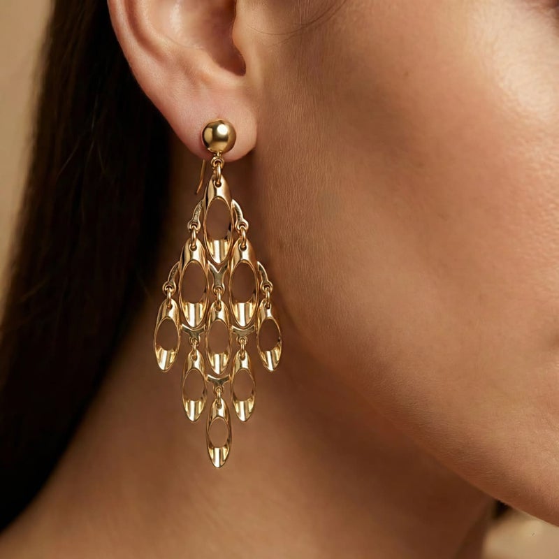 Long gold earrings with a geometric, openwork design, featuring movable charms that sway with your movements, creating a captivating sparkle. A luxurious and modern piece that will turn heads. - Image 2